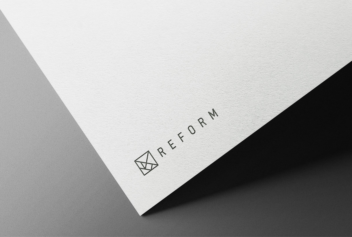 Reform Designers branding by Reform Digital, logo mockup on paper